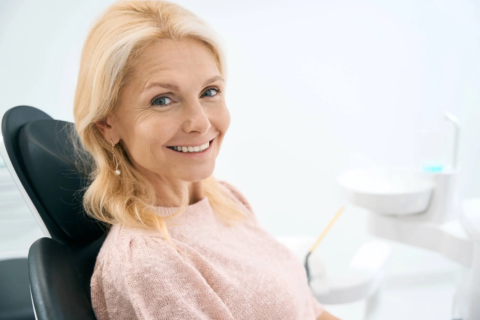 Happy-Woman-After-Replacing-Her-Old-Dental-Crowns-in-Livonia-MI Happy Woman After Replacing Her Old Dental Crowns in Livonia MI